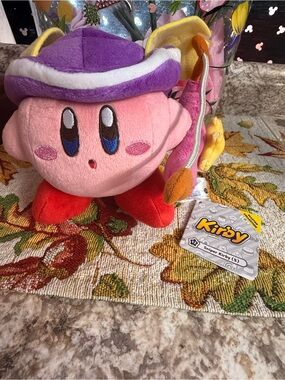 Kirby Plush Toy in Pink with Purple Hat and Red Feet